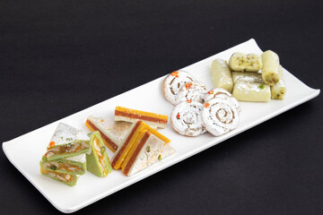 Various Authentic Cashew Nuts Indian Mithai Kaju Gulkand Kaju Diamond Kaju Jalebi Kaju Pista Roll Made Of Grated Cashews Mixed With Crumbled Khoya Mawa Kesar Mava Elaichi Khoa In Desi Ghee
