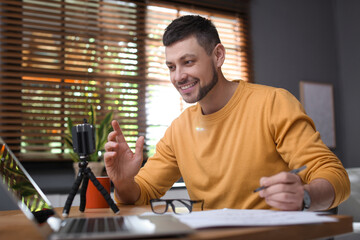 Teacher conducting online lesson at home during COVID-19 quarantine