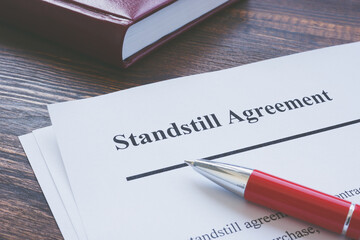 Legal term Standstill Agreement information and red pen.