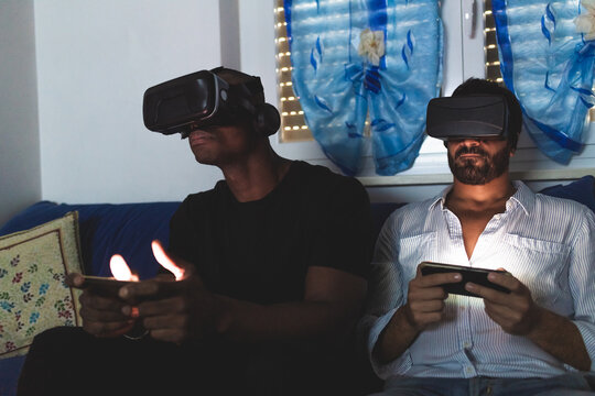 Men using virtual reality headsets with smart phones