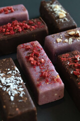 Multicolored Vegetarian glazed cheese, dessert for vegan children. Sugar free concept.