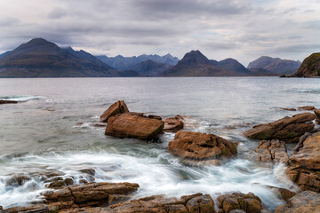 Looking out over the mountains from the rocky beach at Elgol