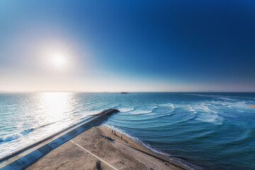 Obraz na płótnie Canvas 海と砂浜と太陽