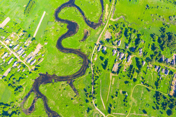 Aerial view of the rural landscape from above - rivers, fields, forests, roads. Territory sounding surveying, topoography mapping.