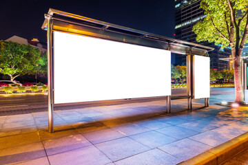 Night shot of a luminous advertising lightbox or display at a bus stop in Shanghai,China.