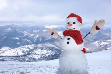 Obraz premium Funny snowman outdoors on sunny day, space for text