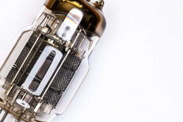 Large power electron tube for HiFi audio amplifier. Artificial light from above, top shot of the...