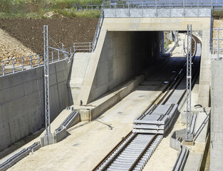 Underpass and tunnel for the construction of a new railway line. Detail of sewage and metal lattice...