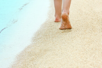beautiful footprints in the sand by the sea background