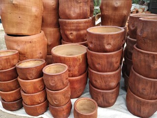 Earthen plant pot stack in a roadside shop near at Matigara, Siliguri, West Bengal, India. shot on 14 February 2021.