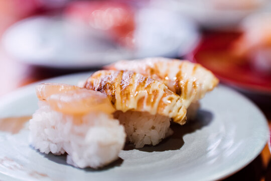 Taipe, Taiwan - December 13 2020: Sushiro restaurant in Taipe, Taiwan. Sushiro is the large chain of conveyor belt sushi restaurant in Japan.
