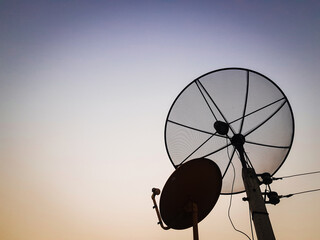 A satellite dishes at evening time