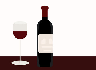 Bottle and glass with red wine