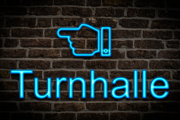 Fototapeta premium Leuchtreklame Turnhalle