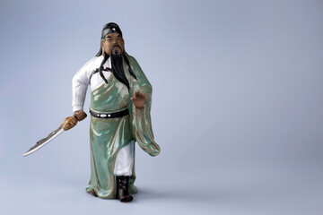 A porcelain figurine from China depicting a Chinese warrior of yesteryear
