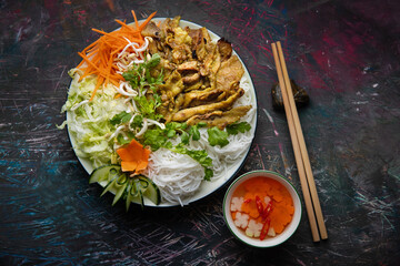 Bun cha, vietnamese grilled pork with noodles and vegetables