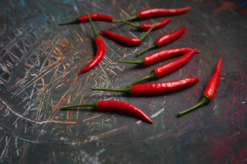 Red hot chili pepper on scratched background