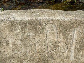 dick streetart in bhutan on stone wall background