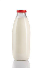 Bottle of milk on white background