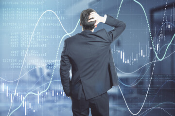 Stock market analytics concept with businessman holding his head, analyzing forex chart graphs, diagram and candlestick on digital screen