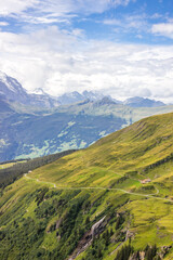 Fototapeta na wymiar The Grindewald Valley and First viewpoint in Switzerland on a sunny day