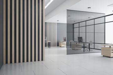 Modern openspace office with airy partition and blank striped wooden wall opposite big window....