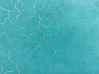 Textured wall, old decorative plaster for walls, azure color. Background, texture