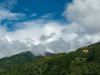 clouds over the mountains in Paro, Bhutan
