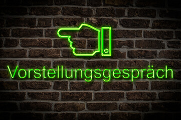 Fototapeta premium Leuchtreklame Vorstellungsgespräch