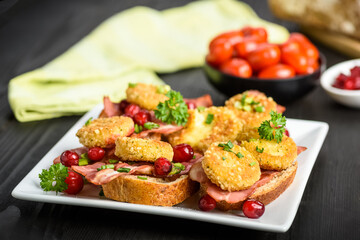 sandwich with fried camembert cheese and bacon