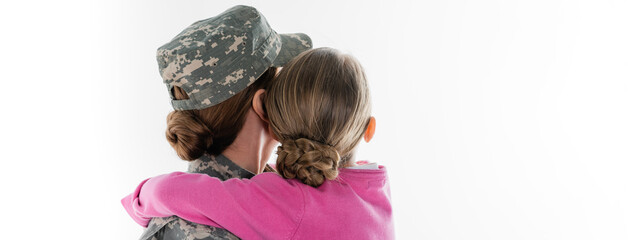 Fototapeta na wymiar Back view of child hugging mother in camouflage isolated on white, banner