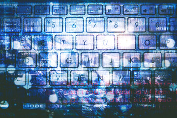 Keyboard of laptop with modern city background