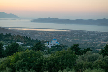 sunset over the church in Kos Island, Greece
