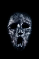 Creepy ghost head isolated on black background