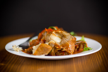 whole fish hake stewed with carrots, beets, peppers and other