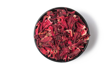 Fototapeta premium Red tea hibiscus in spoon isolated on white in studio