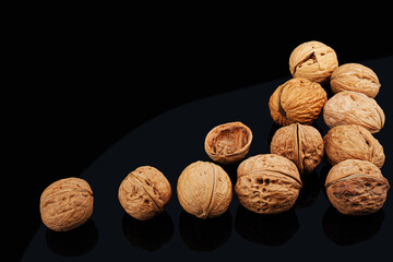 Walnuts on a black background