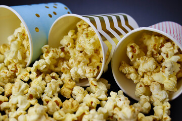 caramel popcorn spilled out of paper cups