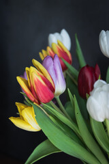 Fresh tulips inside a transparent vase