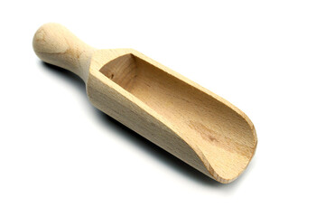 Small wooden scoop for spices isolated on white background