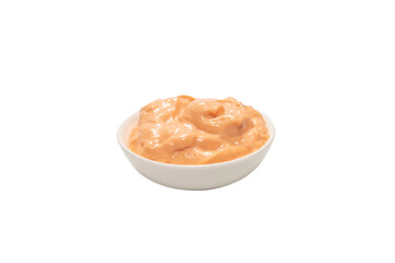Sauce in a bowl isolated on white.