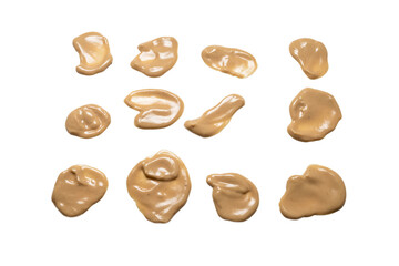 Mushroom sauce splashes isolated on white background.