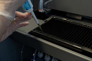 woman in laboratory doing tests for vaccine blood extraction and analytical

