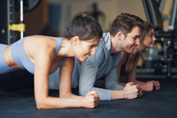 Fototapeta premium Group of people working out in a gym