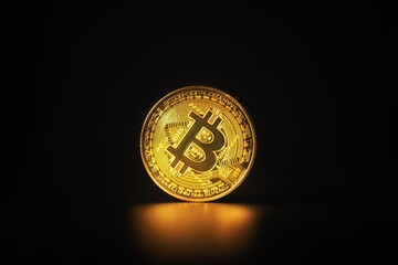 Physical shiny bitcoin agains dark background