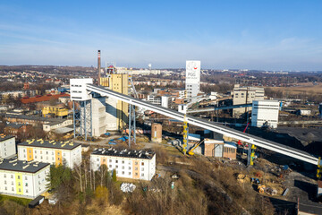 Aerial view of black coal mine in Poland. Industrial place from above. Heavy industry top view.