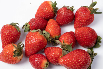 lots of strawberries on the white table