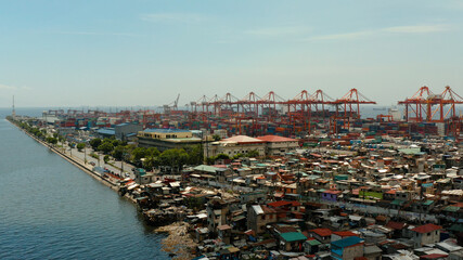 Sea port with container terminal in the city of Manila. Largest cargo port. modern harbor and...