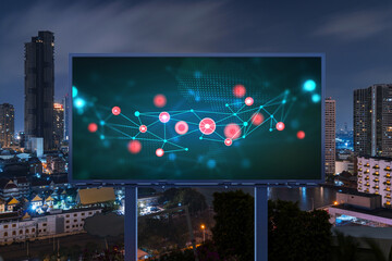 Information flow hologram on road billboard, night panorama city view of Bangkok. The largest technological center in Southeast Asia. The concept of programming science.