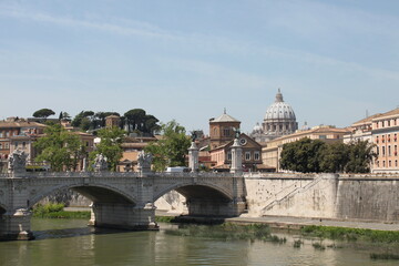 view of the Tiber river from the embankment on a sunny day, Italy
